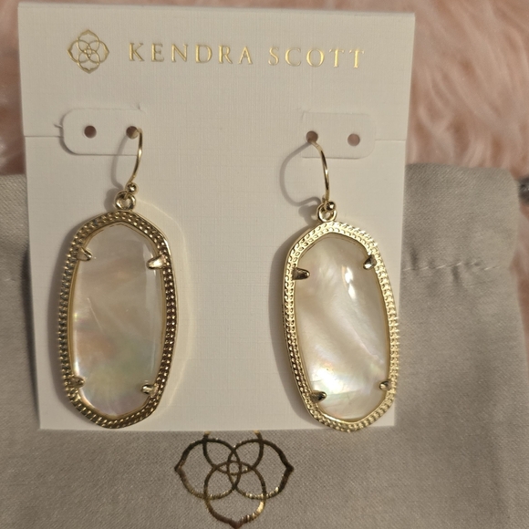 Kendra Scott Elle Gold Drop Earrings in Ivory Pearl. - Picture 9 of 14
